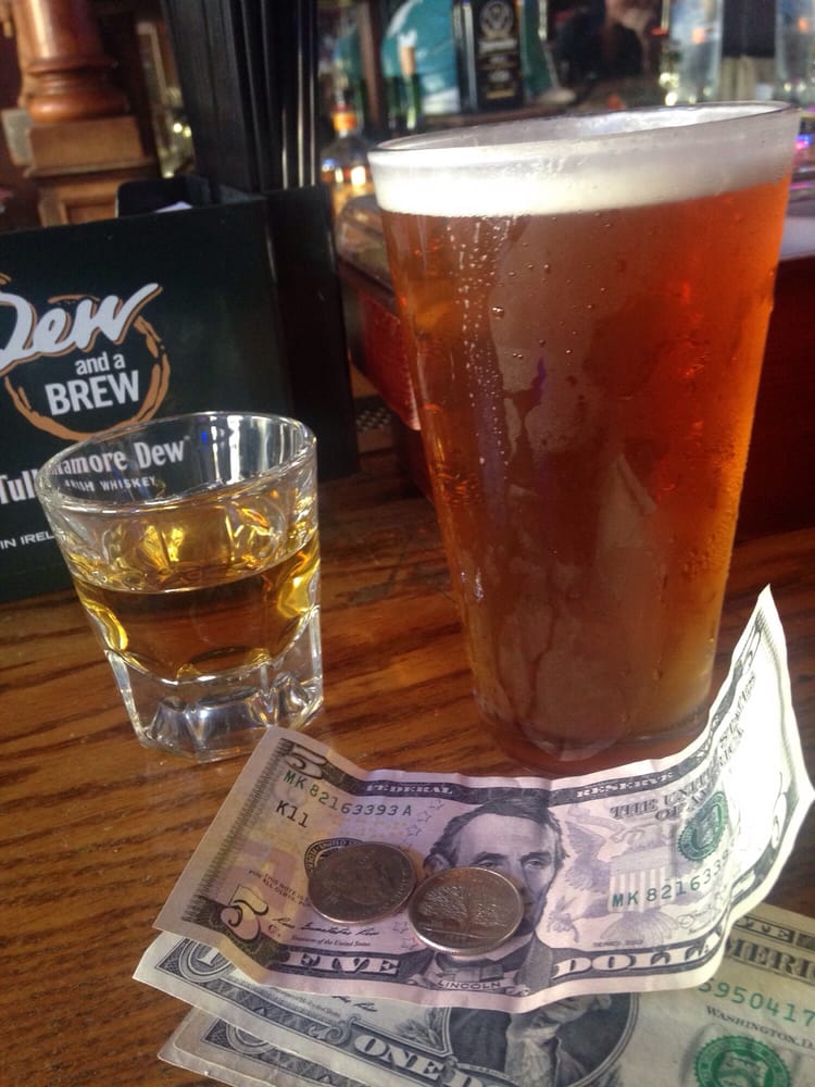 A beer and a shot on the bar